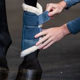 Eskadron Classic Sports Mesh Faux Fur Tendon Boots in Steel Blue being fastened